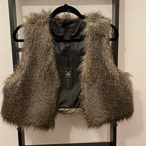 Kim Kardashian size large cropped vest